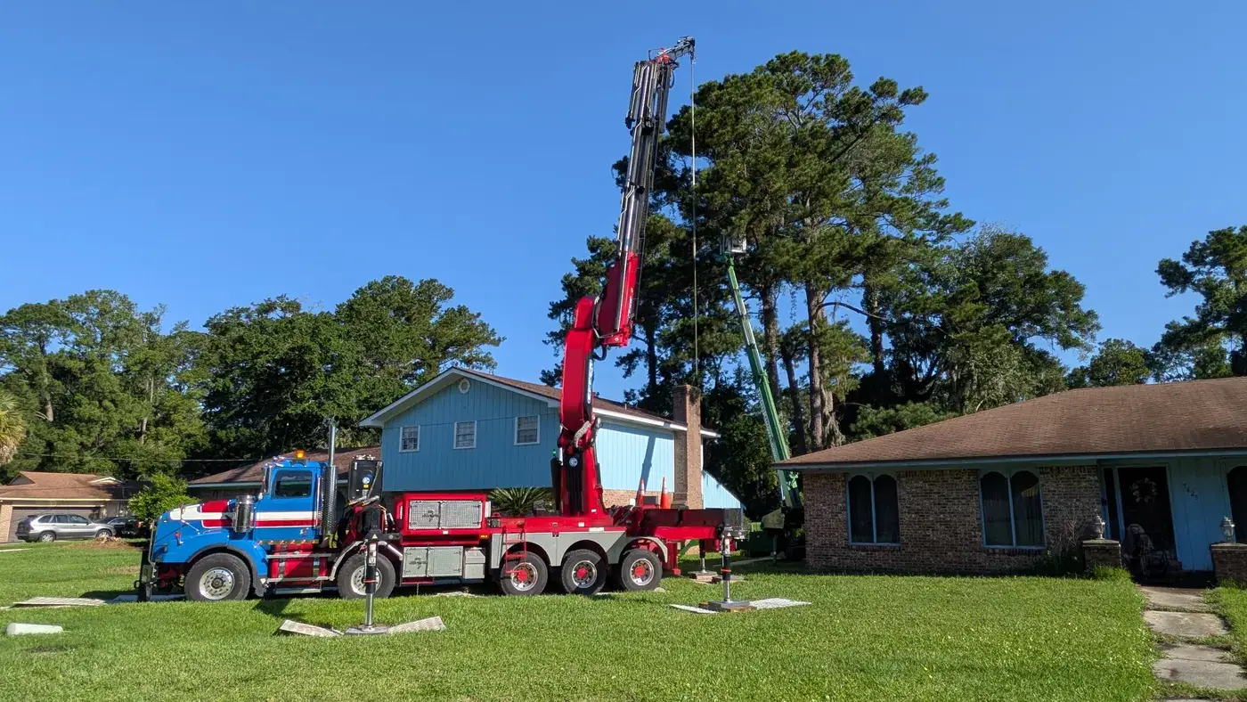 Crane tree removal — crane tree removal in Jacksonville, FL by Jax Tree Removal