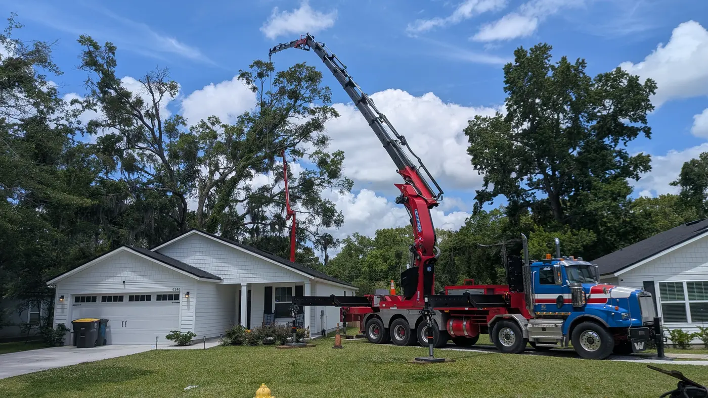 Crane tree removal — crane tree removal in Jacksonville, FL by Jax Tree Removal